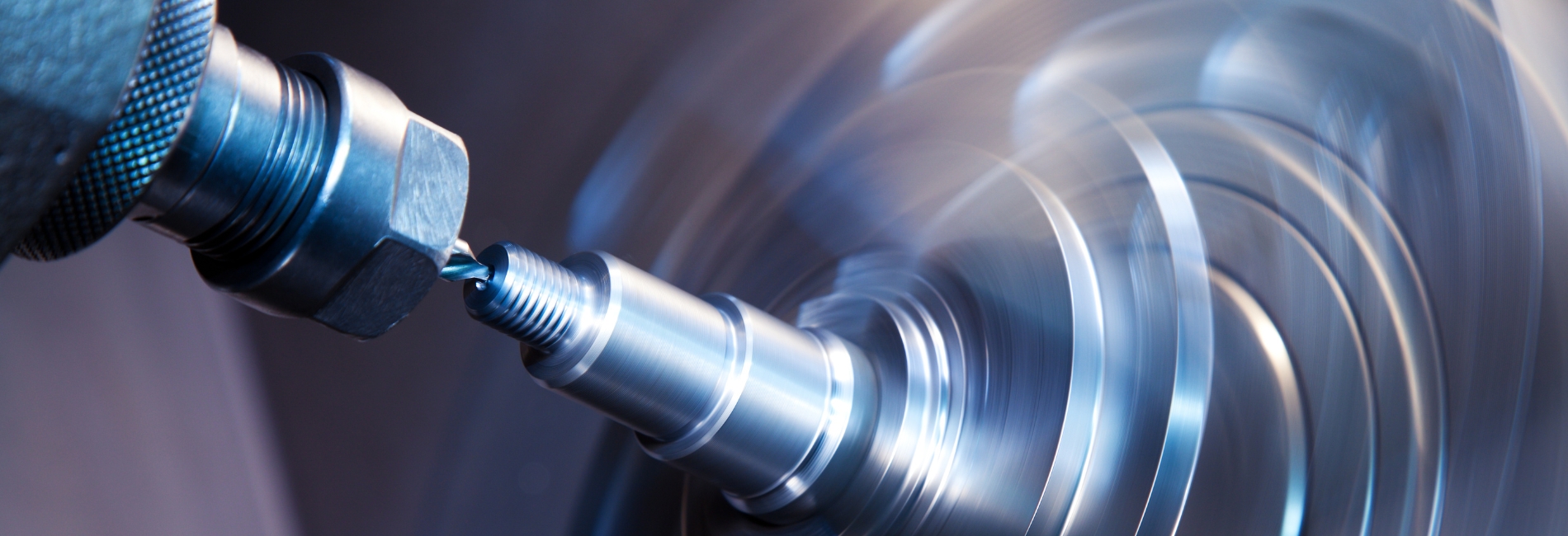 a close-up of a metal object on a Lathe