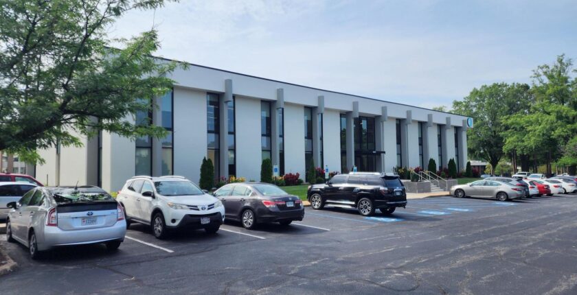 Only CNC Jobs Office with cars parked in front of it