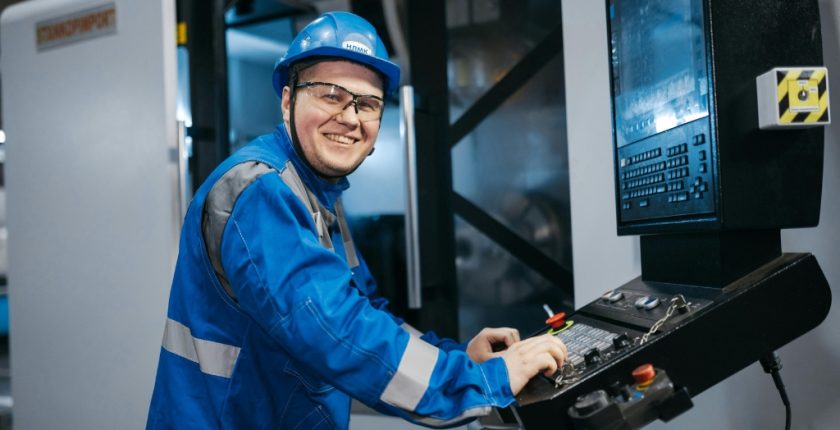 CNC Operator working on CNC machine as part of CNC operator recruitment strategy