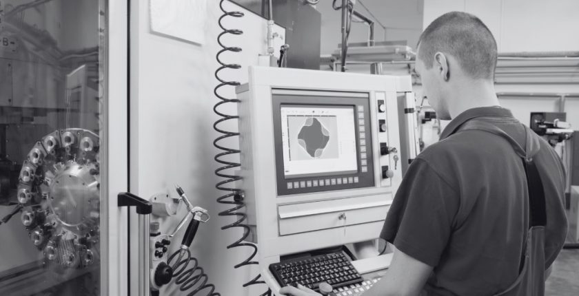 CNC Programmer Working on CNC Machine for Salary